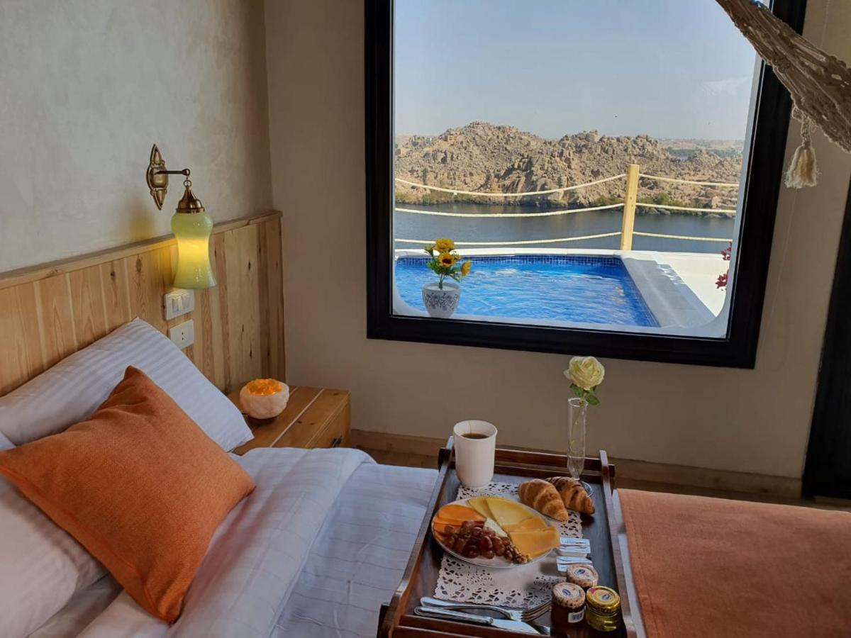 Benben By Dhara Hotels - Adults Only Асуан Экстерьер фото A room at the hotel