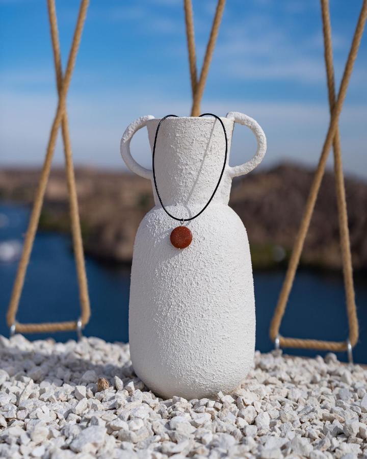 Benben By Dhara Hotels - Adults Only Асуан Экстерьер фото A necklace with a pendant