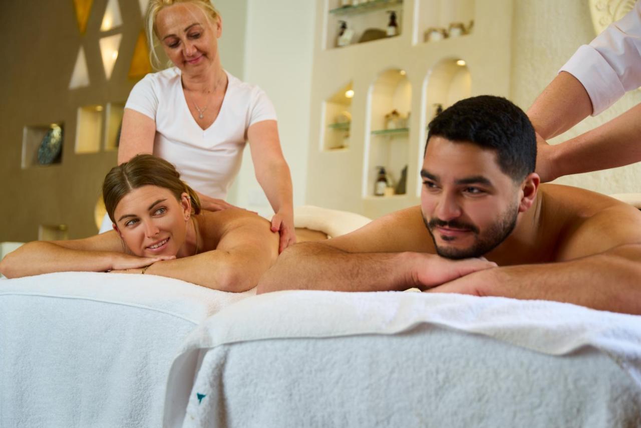 Benben By Dhara Hotels - Adults Only Асуан Экстерьер фото Massage therapists working on a couple
